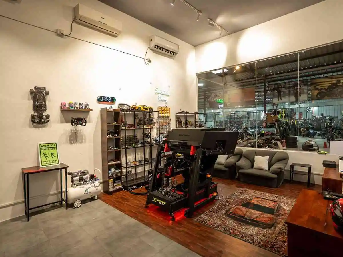 Professional racing simulator wheel and pedal setup at Switchback Racing Pune